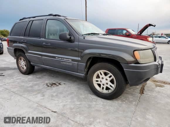 2004 Jeep Grand Cherokee Laredo with VIN 1J4GW48S84C361744, listed as a Copart auction lot 91091115 with 236,095 mi miles and Clean title. Bid and sale history available at DreamBid. Image 4.