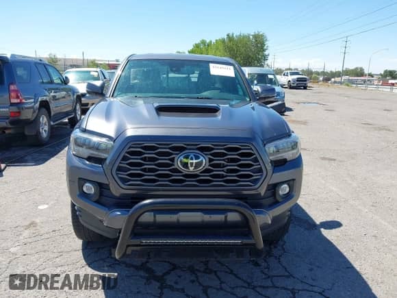 2022 Toyota Tacoma SR z VIN 3TYRZ5CN8NT022029, wystawiony jako IAAI lot #43145211 z przebiegiem 61 365 mil mil oraz . Historia ofert i sprzedaży dostępna na DreamBid. Obrazek 12.
