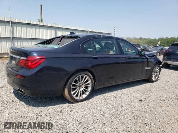 2015 BMW 7 Series 750Li xDrive with VIN WBAYF8C54FG245534, listed as a Copart auction lot 59421255 with 135,026 mi miles and Salvage title. Bid and sale history available at DreamBid. Image 3.