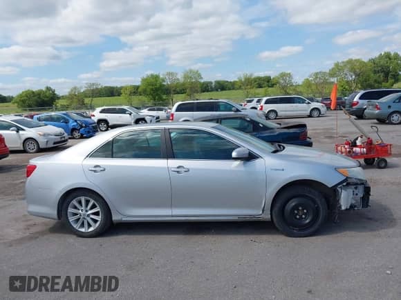 2014 Toyota Camry LE z VIN 4T1BD1FKXEU097389, wystawiony jako IAAI lot #42758735 z przebiegiem 162 617 mil mil oraz . Historia ofert i sprzedaży dostępna na DreamBid. Obrazek 13.