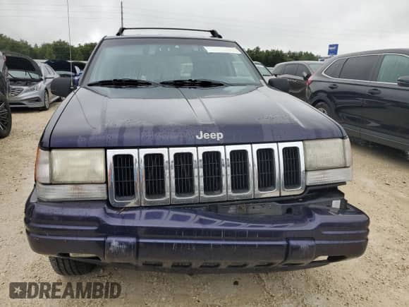 1998 Jeep Grand Cherokee with VIN 1J4FX48S1WC244308, listed as a Copart auction lot 74384714 with Not provided miles and Non repairable. Bid and sale history available at DreamBid. Image 5.