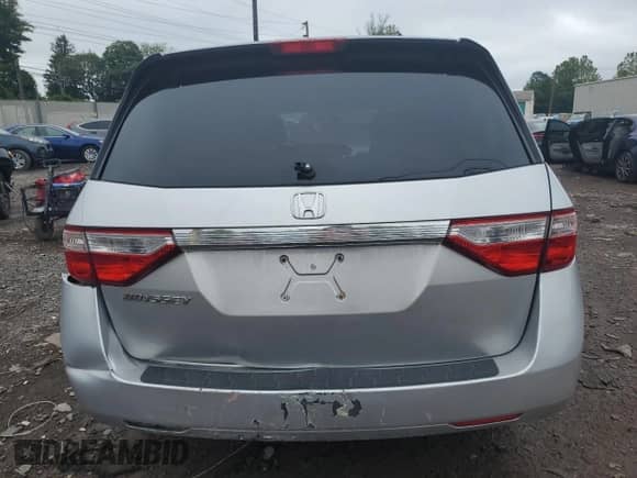 2012 Honda Odyssey LX z VIN 5FNRL5H22CB007913, wystawiony jako Copart lot #60137725 z przebiegiem 131 489 mil mil oraz Szkoda całkowita • Salvage title. Historia ofert i sprzedaży dostępna na DreamBid. Obrazek 6.
