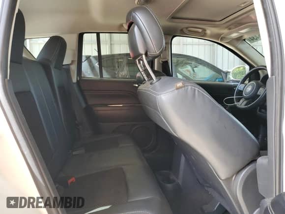 2014 Jeep Compass Latitude with VIN 1C4NJCEB9ED826084, listed as a Copart auction lot 72266434 with 103,718 mi miles and Salvage title. Bid and sale history available at DreamBid. Image 11.
