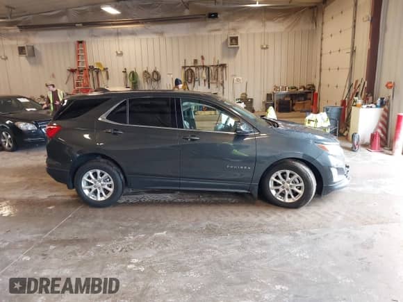 2020 Chevrolet Equinox LT z VIN 2GNAXJEV5L6269561, wystawiony jako IAAI lot #43266523 z przebiegiem 23 277 mil mil oraz . Historia ofert i sprzedaży dostępna na DreamBid. Obrazek 13.