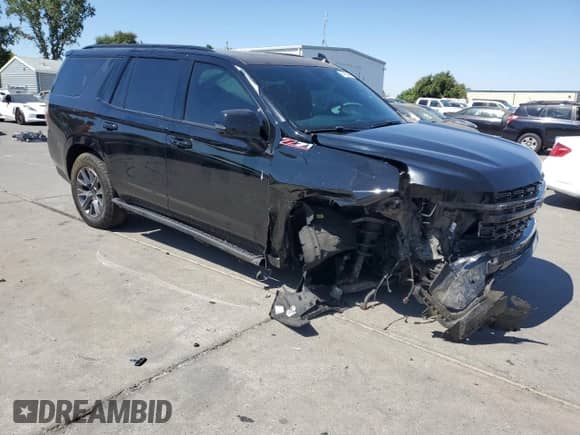 2023 Chevrolet Tahoe Z71 with VIN 1GNSKPKD1PR332098, listed as a Copart auction lot 64883395 with 72,453 mi miles and Salvage title. Bid and sale history available at DreamBid. Image 4.