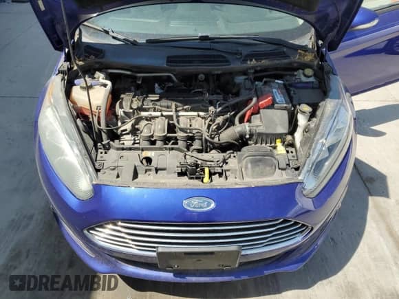 2014 Ford Fiesta SE z VIN 3FADP4BJ1EM174468, wystawiony jako Copart lot #65283015 z przebiegiem 111 626 mil mil oraz Czysty tytuł • Clean title. Historia ofert i sprzedaży dostępna na DreamBid. Obrazek 11.