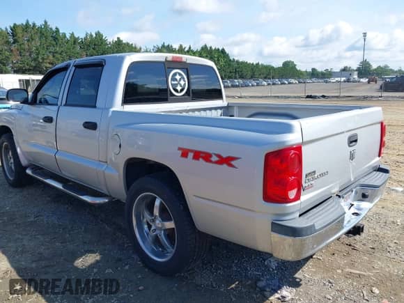 2006 Dodge Dakota SLT with VIN 1D7HE48K76S610868, listed as a IAAI auction lot 42542808 with 244,951 mi miles and . Bid and sale history available at DreamBid. Image 3.