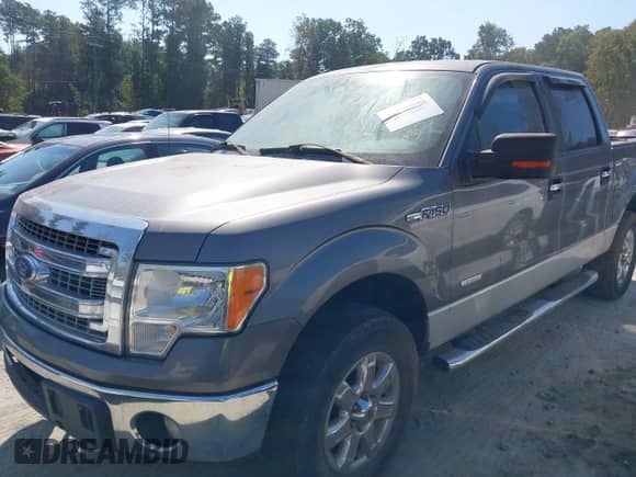 2013 Ford F-150 Lariat with VIN 1FTFW1ET5DFC93463, listed as a IAAI auction lot 43182949 with 133,397 mi miles and . Bid and sale history available at DreamBid. Image 2.
