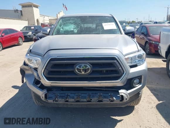 2021 Toyota Tacoma SR5 with VIN 5TFAZ5CN4MX102901, listed as a IAAI auction lot 43136326 with 78,206 mi miles and . Bid and sale history available at DreamBid. Image 12.