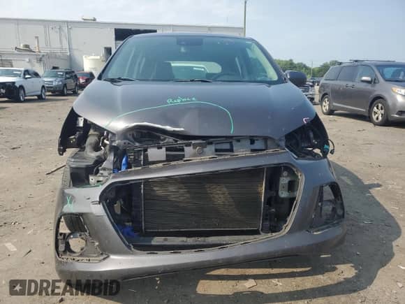 2016 Chevrolet Spark LT z VIN KL8CF6SAXGC587023, wystawiony jako Copart lot #60227095 z przebiegiem 99 570 mil mil oraz Czysty tytuł • Clean title. Historia ofert i sprzedaży dostępna na DreamBid. Obrazek 5.