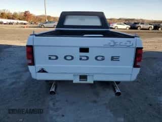 1989 Dodge Dakota z VIN 1B7GG69X7KS181375, wystawiony jako Copart lot #75844234 z przebiegiem 97 842 mil mil oraz Szkoda całkowita • Salvage title. Historia ofert i sprzedaży dostępna na DreamBid. Obrazek 6.