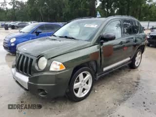 2007 Jeep Compass Limited with VIN 1J8FT57W17D108373, listed as a Copart auction lot 65593775 with 221,027 mi miles and Salvage title. Bid and sale history available at DreamBid. Image 1.