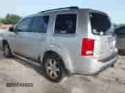 2009 Honda Pilot Touring with VIN 5FNYF38839B022943, listed as a IAAI auction lot 42443006 with 199,184 mi miles and . Bid and sale history available at DreamBid. Image 3.