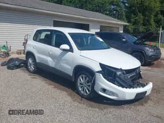 2017 Volkswagen Tiguan S with VIN WVGAV7AX9HK051552, listed as a IAAI auction lot 42871872 with 104,812 mi miles and . Bid and sale history available at DreamBid. Image 1.