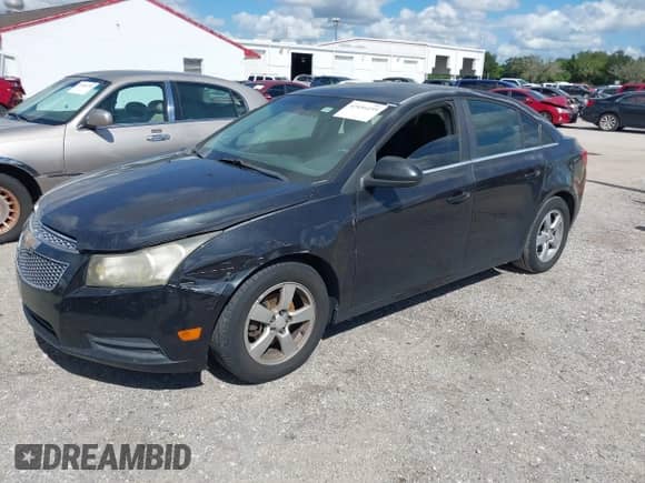 2011 Chevrolet Cruze 1LT z VIN 1G1PF5S94B7156972, wystawiony jako IAAI lot #43456159 z przebiegiem 164 050 mil mil oraz . Historia ofert i sprzedaży dostępna na DreamBid. Obrazek 2.