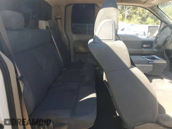 2005 Ford F-150 STX with VIN 1FTRX12WX5FA71172, listed as a Copart auction lot 86429595 with 184,726 mi miles and Salvage title. Bid and sale history available at DreamBid. Image 10.