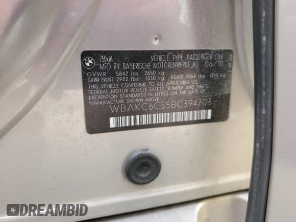 2011 BMW 7 Series 750i xDrive with VIN WBAKC6C55BC394703, listed as a Copart auction lot 85719875 with 115,117 mi miles and Salvage title. Bid and sale history available at DreamBid. Image 12.