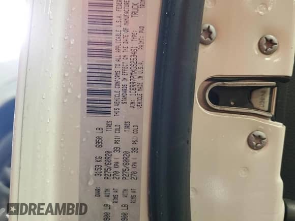 2016 Ram 1500 Longhorn with VIN 1C6RR7PMXGS253461, listed as a Copart auction lot 70214735 with 124,351 mi miles and Salvage title. Bid and sale history available at DreamBid. Image 13.