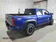 2024 Toyota Tacoma TRD Off Road with VIN 3TMLB5JN6RM026286, listed as a Copart auction lot 81666825 with 27,497 mi miles and Salvage title. Bid and sale history available at DreamBid. Image 3.