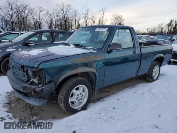 1994 Dodge Dakota z VIN 1B7FL26X2RW148582, wystawiony jako Copart lot #87962505 z przebiegiem 166 363 mil mil oraz Szkoda całkowita • Salvage title. Historia ofert i sprzedaży dostępna na DreamBid. Obrazek 1.