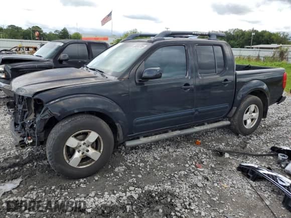 2005 Nissan Frontier SE with VIN 1N6AD07U15C424064, listed as a Copart auction lot 68090785 with 153,296 mi miles and Salvage title. Bid and sale history available at DreamBid. Image 1.
