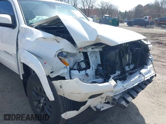 2021 Toyota Tacoma SR5 z VIN 3TMDZ5BN4MM118505, wystawiony jako IAAI lot #41920089 z przebiegiem 30 693 mil mil oraz . Historia ofert i sprzedaży dostępna na DreamBid. Obrazek 6.