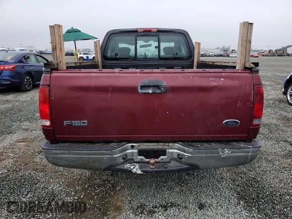 2003 Ford F-150 XL with VIN 1FTRX17283NA09956, listed as a Copart auction lot 81526395 with 195,707 mi miles and Salvage title. Bid and sale history available at DreamBid. Image 6.