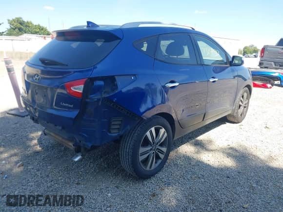 2014 Hyundai Tucson SE with VIN KM8JU3AGXEU804730, listed as a IAAI auction lot 43154883 with 116,472 mi miles and . Bid and sale history available at DreamBid. Image 4.