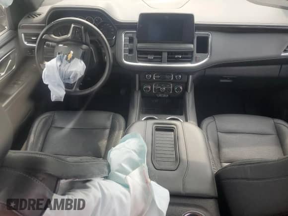 2024 Chevrolet Suburban LS with VIN 1GNSCBKD7RR102052, listed as a Copart auction lot 71872435 with 61,369 mi miles and Salvage title. Bid and sale history available at DreamBid. Image 8.