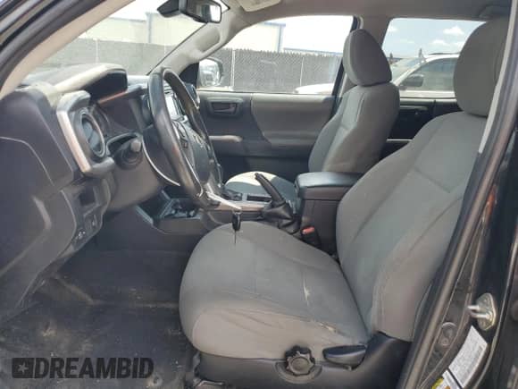 2018 Toyota Tacoma SR5 с VIN 5TFBZ5DN4JX003834, выставлен на аукционе Copart как лот 69634275 с пробегом 297 503 миль миль и На запчасти • Non repairable. История ставок и продаж доступна на DreamBid. Изображение 7.