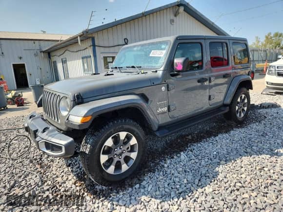 2022 Jeep Wrangler Unlimited Sahara with VIN 1C4HJXENXNW119868, listed as a Copart auction lot 80207235 with 65,916 mi miles and Salvage title. Bid and sale history available at DreamBid. Image 1.