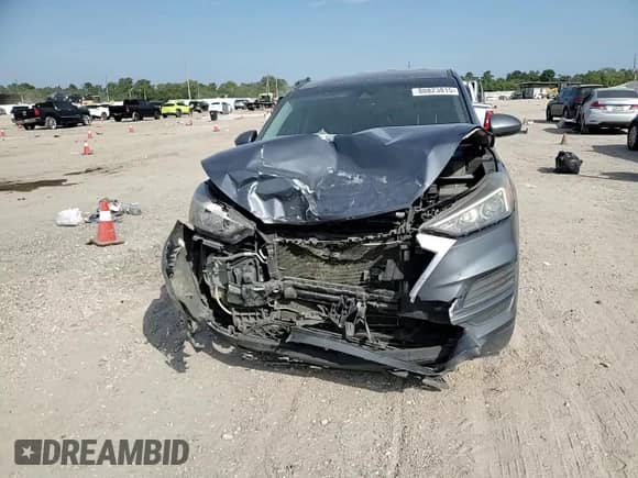 2019 Hyundai Tucson SE z VIN KM8J2CA4XKU859136, wystawiony jako Copart lot #80823815 z przebiegiem 124 547 mil mil oraz Szkoda całkowita • Salvage title. Historia ofert i sprzedaży dostępna na DreamBid. Obrazek 13.