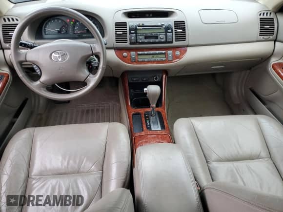 2003 Toyota Camry LE с VIN JTDBF30K330092929, выставлен на аукционе Copart как лот 71908275 с пробегом 163 921 миль миль и Списание • Salvage title. История ставок и продаж доступна на DreamBid. Изображение 8.