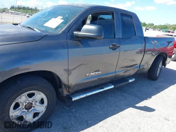 2012 Toyota Tundra z VIN 5TFRU5F19CX026861, wystawiony jako IAAI lot #41827542 z przebiegiem 135 428 mil mil oraz . Historia ofert i sprzedaży dostępna na DreamBid. Obrazek 6.