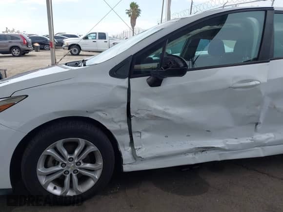 2019 Chevrolet Cruze LS with VIN 3G1BC6SM1KS546877, listed as a IAAI auction lot 43100765 with 54,667 mi miles and . Bid and sale history available at DreamBid. Image 6.