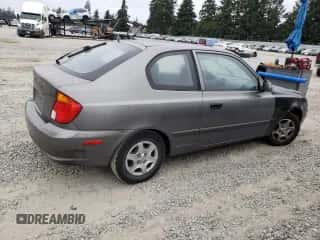 2004 Hyundai Accent GL с VIN KMHCG35C44U299645, выставлен на аукционе Copart как лот 63728174 с пробегом 159 604 миль миль и Чистый • Clean title. История ставок и продаж доступна на DreamBid. Изображение 3.