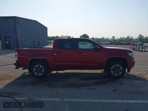 2021 Chevrolet Colorado 4WD Z71 z VIN 1GCGTDEN4M1113032, wystawiony jako IAAI lot #42410079 z przebiegiem 45 329 mil mil oraz . Historia ofert i sprzedaży dostępna na DreamBid. Obrazek 14.
