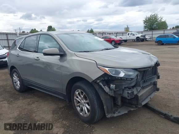 2018 Chevrolet Equinox LT z VIN 3GNAXSEV5JS595963, wystawiony jako IAAI lot #43358877 z przebiegiem 188 305 mil mil oraz . Historia ofert i sprzedaży dostępna na DreamBid. Obrazek 1.