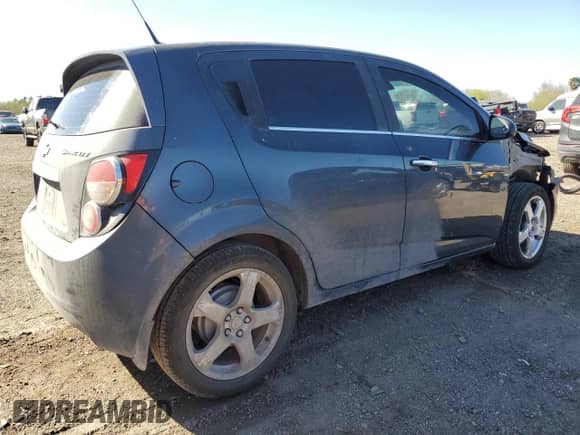 2012 Chevrolet Sonic LTZ with VIN 1G1JE6SH4C4219853, listed as a Copart auction lot 46516795 with 136,292 mi miles and Salvage title. Bid and sale history available at DreamBid. Image 3.