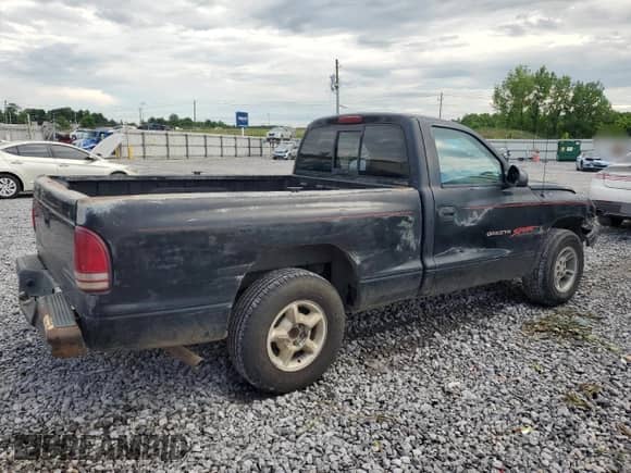 1997 Dodge Dakota с VIN 1B7FL26X9VS201893, выставлен на аукционе Copart как лот 57107225 с пробегом 117 652 миль миль и Списание • Salvage title. История ставок и продаж доступна на DreamBid. Изображение 3.