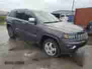2017 Jeep Grand Cherokee Overland with VIN 1C4RJECG5HC605538, listed as a Copart auction lot 81946415 with 100,658 mi miles and Salvage title. Bid and sale history available at DreamBid. Image 4.