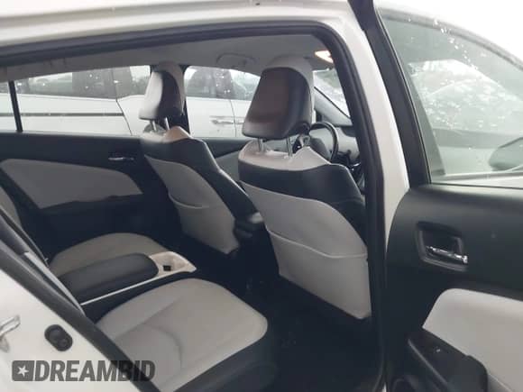 2018 Toyota Prius Plus z VIN JTDKARFP0J3084142, wystawiony jako IAAI lot #41936736 z przebiegiem 50 699 mil mil oraz . Historia ofert i sprzedaży dostępna na DreamBid. Obrazek 8.