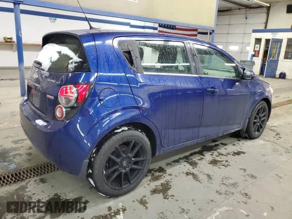 2014 Chevrolet Sonic LT z VIN 1G1JD6SB6E4208547, wystawiony jako Copart lot #45384325 z przebiegiem 111 973 mil mil oraz Szkoda całkowita • Salvage title. Historia ofert i sprzedaży dostępna na DreamBid. Obrazek 3.