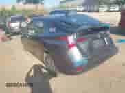 2021 Toyota Prius LE with VIN JTDL9MFU8M3028928, listed as a IAAI auction lot 43099318 with 72,833 mi miles and . Bid and sale history available at DreamBid. Image 3.