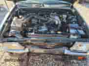 1999 Toyota Tacoma z VIN 4TAPM62N8XZ457865, wystawiony jako Copart lot #85175585 z przebiegiem 222 153 mil mil oraz Szkoda całkowita • Salvage title. Historia ofert i sprzedaży dostępna na DreamBid. Obrazek 11.