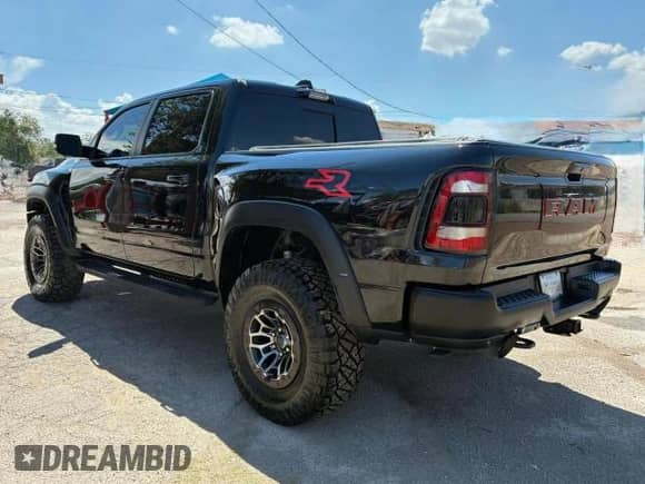 2021 Ram 1500 TRX с VIN 1C6SRFU9XMN902178, выставлен на аукционе Copart как лот 71024015 с пробегом 73 598 миль миль и Чистый • Clean title. История ставок и продаж доступна на DreamBid. Изображение 3.