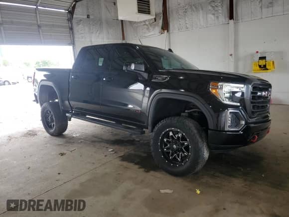 2020 GMC Sierra 1500 AT4 with VIN 1GTP9EEL2LZ337743, listed as a Copart auction lot 61227235 with 43,404 mi miles and Salvage title. Bid and sale history available at DreamBid. Image 4.
