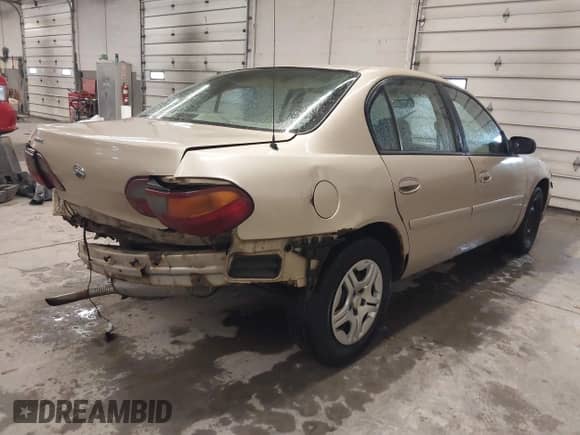 2005 Chevrolet Malibu Classic z VIN 1G1ND52F25M126197, wystawiony jako IAAI lot #41635127 z przebiegiem 218 168 mil mil oraz . Historia ofert i sprzedaży dostępna na DreamBid. Obrazek 4.