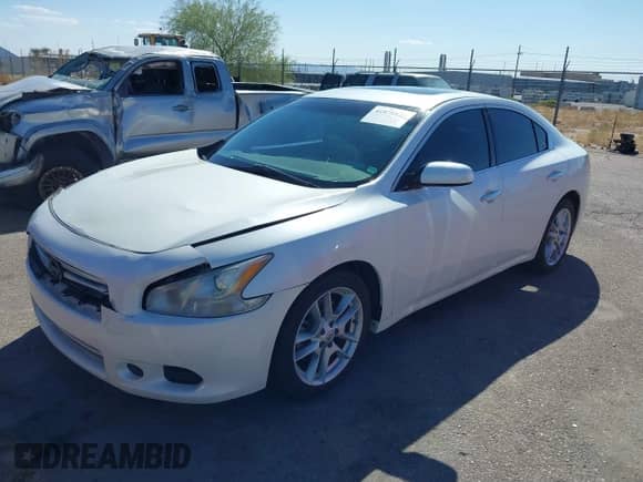 2014 Nissan Maxima SV with VIN 1N4AA5AP7EC495707, listed as a IAAI auction lot 41878822 with 197,088 mi miles and . Bid and sale history available at DreamBid. Image 2.