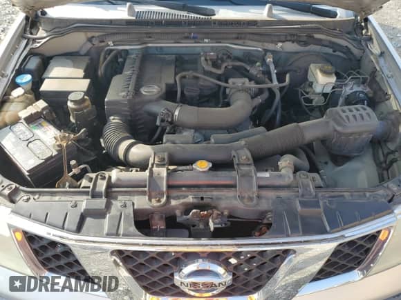 2005 Nissan Frontier XE with VIN 1N6BD06T75C440346, listed as a Copart auction lot 65784415 with 144,437 mi miles and Salvage title. Bid and sale history available at DreamBid. Image 11.